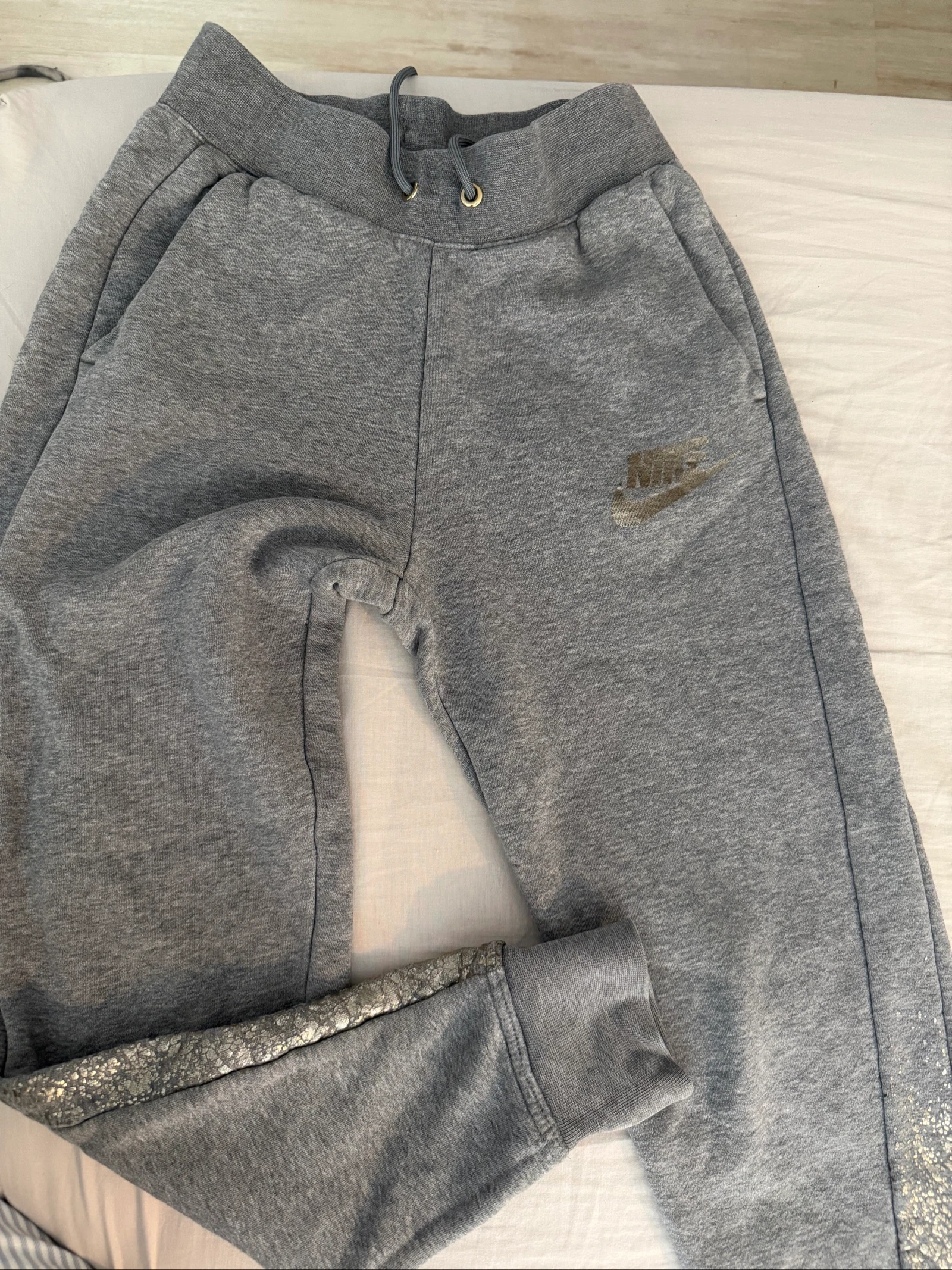 Jogging Nike détails doré